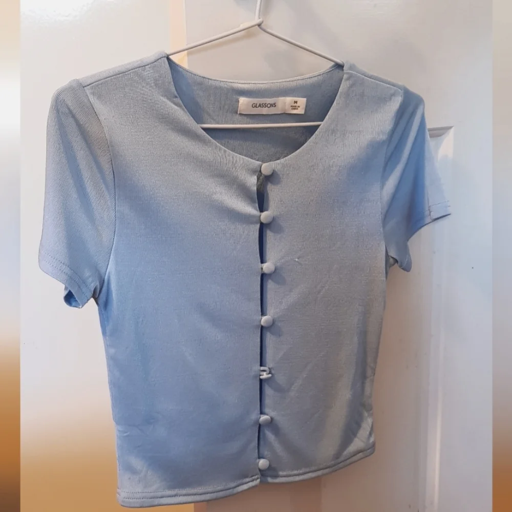 ⭐Host Pick⭐ Pale pastel blue stretch Glassons top M - Picture 1 of 5